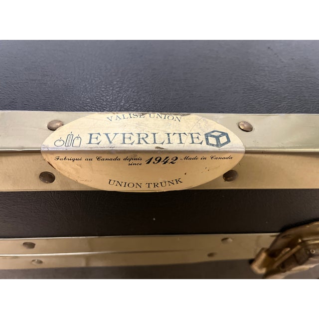 Classic antique steamer trunk, MCM black and gold/brass accents, leather handles, cedar interior panels. Quality piece...