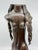 A wonderful bronze of a nude woman with long cornrows. It is solid cast and quite heavy. The sculpture is monogrammed on...
