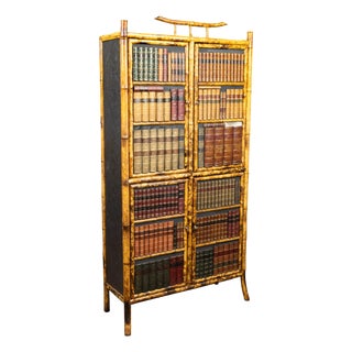 English 1900s Bamboo Cabinet with Faux Books Façade and Splaying Legs For Sale