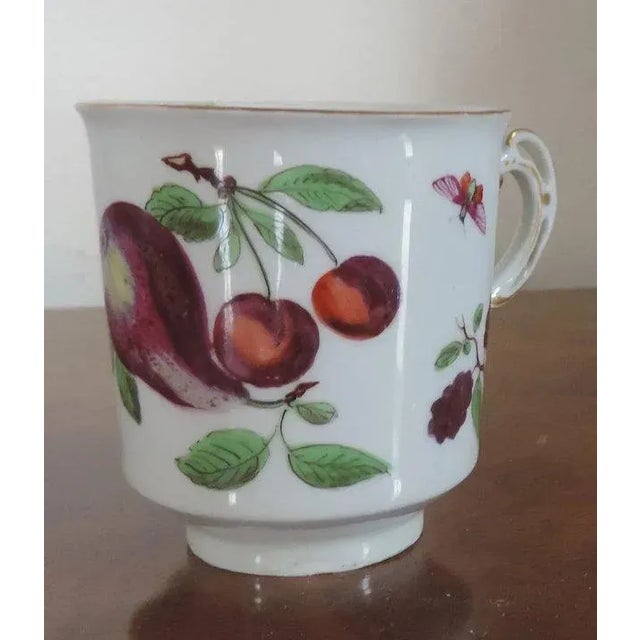 Antique 18th c. Chelsea gold anchor coffee can or handled cup decorated with cherries, pears, strawberries, blackberries,...