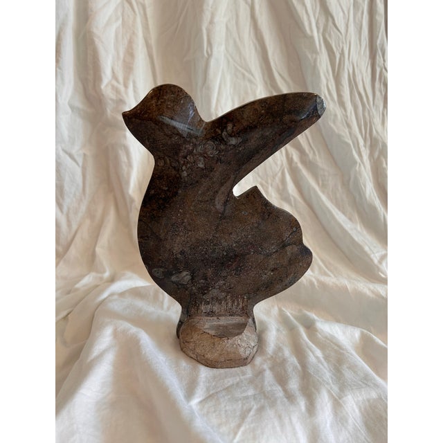 Authentic polished, hand-carved ammonite and orthoceras fossil sculpture from Morocco. Earthy and modern, mixes well with...