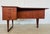 A superb Danish Modern boomerang desk from the mid-1960s, attributed to Peter Løvig Nielsen. This beautiful, teak piece is...