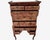 This is an antique Georgian style highboy or tall chest-on-stand in a beautifully figured burled walnut with outstanding...