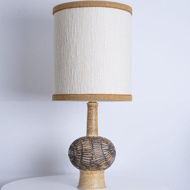 Stunning table lamp with brown and beige ceramics by axella, manufactured in the 1970s in denmark. Combined with a new...
