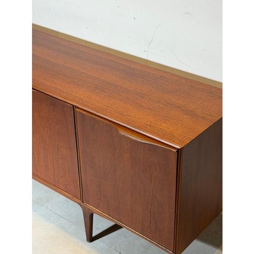 Exceptional extra-large mid-century modern sideboard from the Dunvegan range by McIntosh Furniture . Crafted in richly...