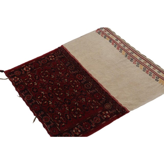 Handwoven in wool, this 4’3 x 4’9 textile is a collectible antique tribal bag, believed to originate from Russia circa...