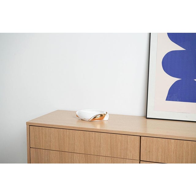 The decorative porcelain platter was made in the 1970s in Italy. Decorative porcelain platter – elegant, oval-shaped,...