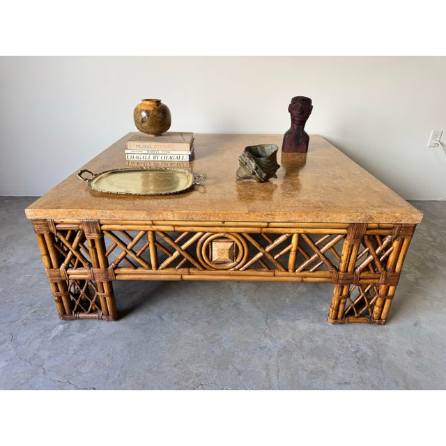 Elevate your space with this striking vintage Chinoiserie-style square coffee table, a statement piece that effortlessly...