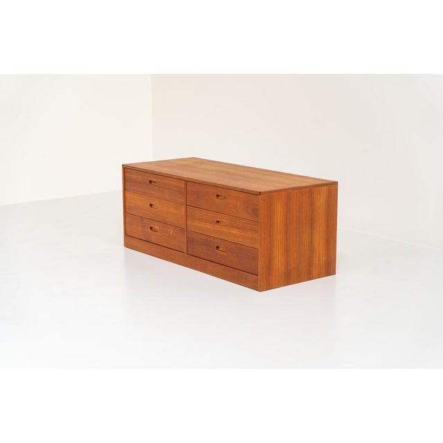 Chest of drawers by Erik Brouer for Brouer Møbelfabrik (Denmark, 1960s). A minimalistic chest of drawers with a nice warm...