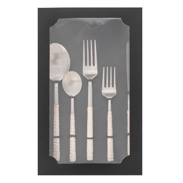 Introducing the Rattan Stainless Steel Cutlery Set of 5, the perfect addition to any dining table. This elegant set...