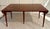 Here is a fantastic vintage expanding dining table by Watertown Slide, likely made in the mid-20th century, circa...