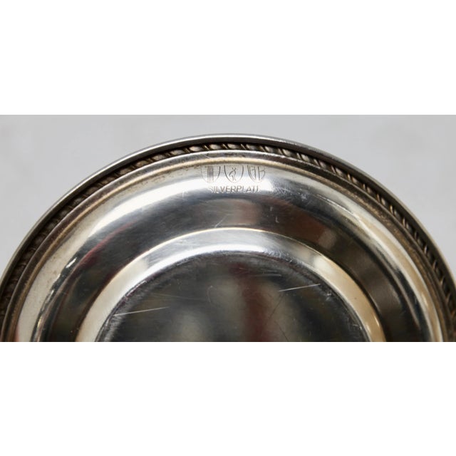 Silver plate wine bar funnel on stand signed see picture. A practical decorative addition, with a Grapes pattern, for the...