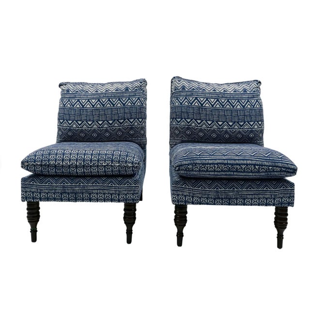 From the personal collection of Kathy Hilton. Presenting a chic pair of blue and white armless slipper chairs with dark...