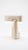 A table lamp that behaves like sculpture. Its folded, tile-built form reads as one continuous gesture, and when the light...
