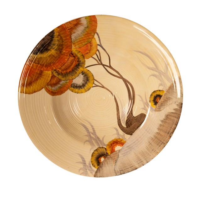 Antique Art Deco Monumental hand-painted pottery Bizarre Ware wall charger by Clarice Cliff, circa 1930. This very large...