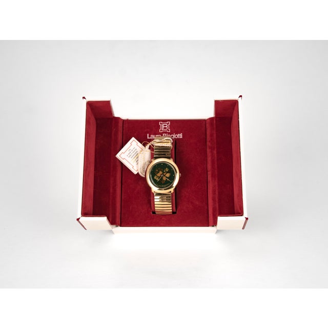 Vintage women's wristwatch by Laura Biagiotti (1990s), featuring Italian design and a Swiss quartz movement (Swiss Made)....