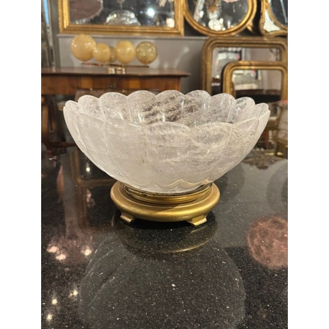 The Vintage French Rock Crystal Bowl on Giltwood Stand is a stunning piece that adds a touch of elegance to any room. A...