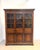 Impressive antique oak display and storage cabinet, crafted in solid oak with a beautifully aged warm patina. The upper...