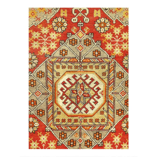 Add a touch of vintage charm to your home with this Turkish Rug. Handmade with 100% wool, this area rug features a...