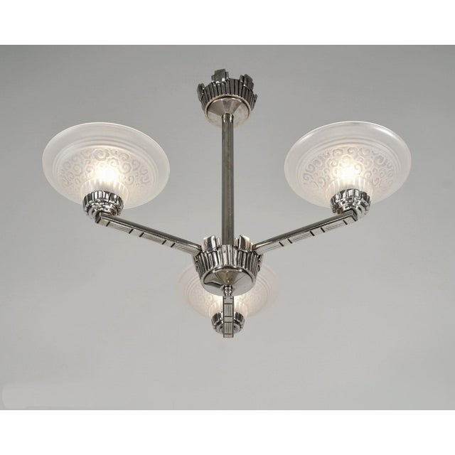 MULLER FRERES A rare French 1930-35 art deco chandelier in nickel plated solid brass or bronze holding three cups by...