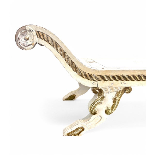 Vintage carved wooden Empire Revival window seat (bench) with rolled arms and claw feet. This piece is a blend of European...