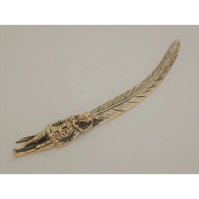 A circa 1930's fine quality English brass courtier in Elizabethan dress with ruff and feather. This is a one-of-a-kind...