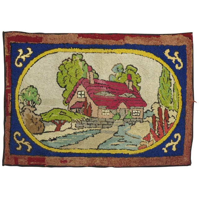 A handmade decorative American hooked rug from the middle of the 20th century depicting a quiet little home on the...