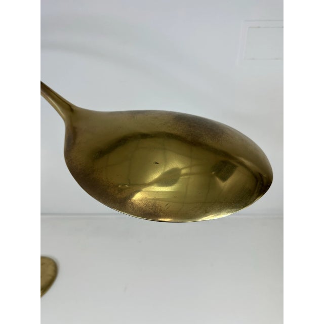 1960’s Sculptural Brass Floor Lamp. Weighted base counter balances the arched design. Unknown signature