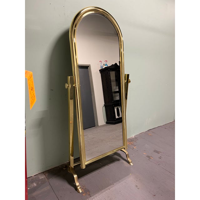 Fabulous Brass Cheval Mirror. Massive presence with a 2" frame. Simple lines that pack a punch. Hooved feet base and large...