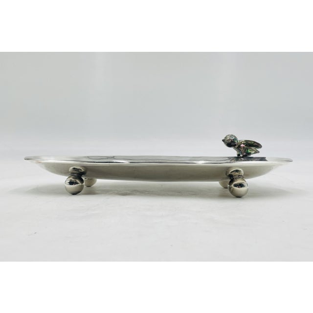 A captivating example of mid-century Mexican modernist silver design, this handcrafted Los Castillo Taxco footed serving...
