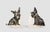 Pair of french Art Déco painted ceramic bookends shaped like Scotch Terrier dogs By: unknown Material: ceramic, enamel,...