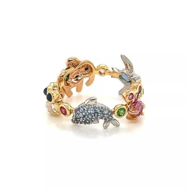 This is an adorable full circle fish an animal ring, crafted from 18k yellow and rose gold with platinum featuring...