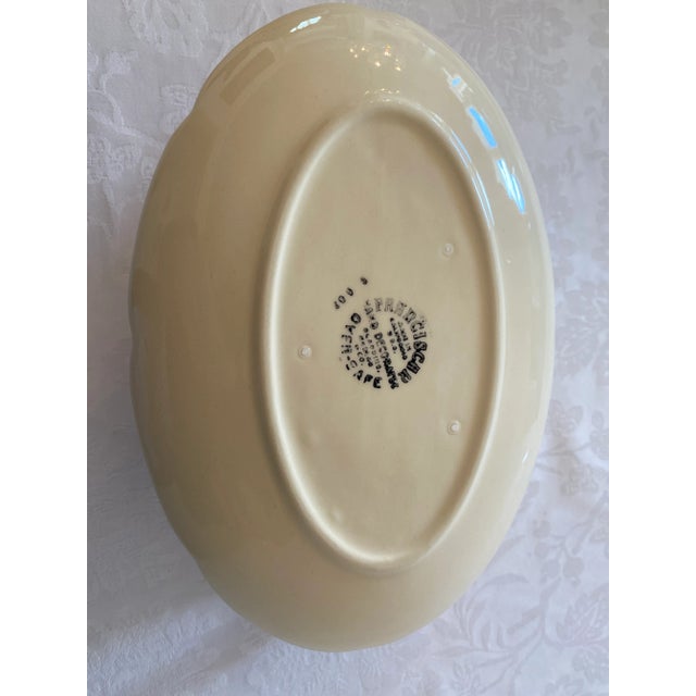 Late 20th Century Franciscan Apple Pattern Gravy Boat with Attached Plate. Measures 8 1/2 inches in length, 5 1/2 in width...