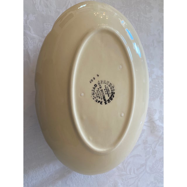 Late 20th Century Franciscan Apple Pattern Gravy Boat with Attached Plate. Measures 8 1/2 inches in length, 5 1/2 in width...