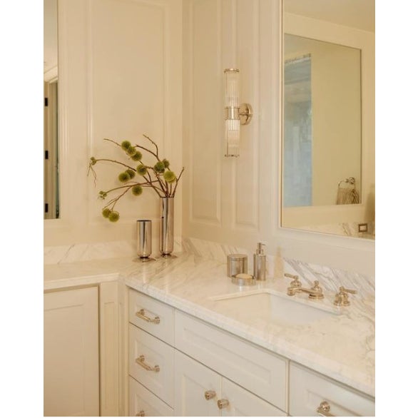 "The Allen" is a sophisticated sconce with art deco inspiration. An elegant style for ideal ambiance in any room in the...