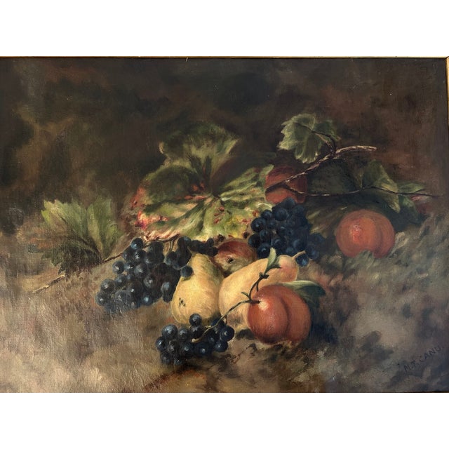 Antique early 1900's oil on canvas still life featuring grapes, pears, peaches, and vine leaves in a warm, Old World...