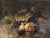 Antique early 1900's oil on canvas still life featuring grapes, pears, peaches, and vine leaves in a warm, Old World...