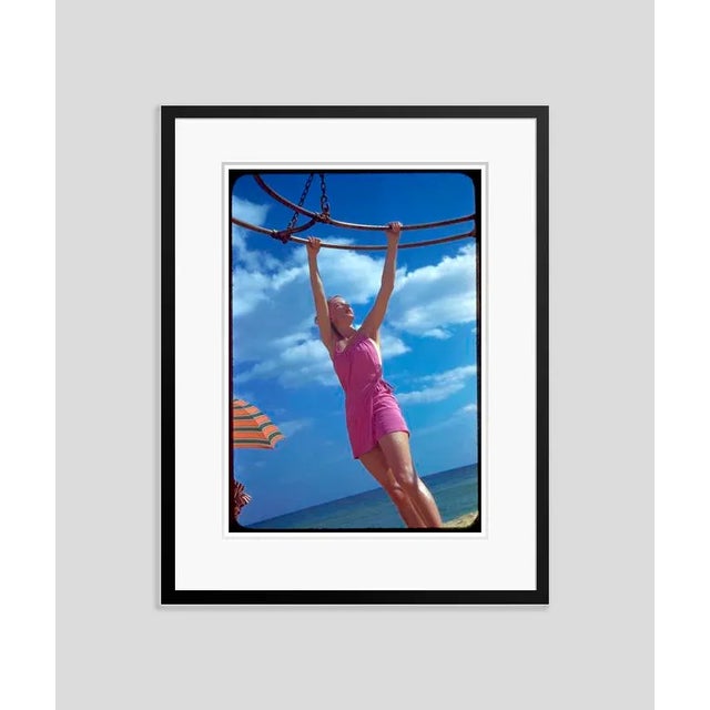 Florida Vogue 1944 by Toni Frissell February 1944 Vogue Florida Fashion shoot featuring a model in a pink bathing suit...