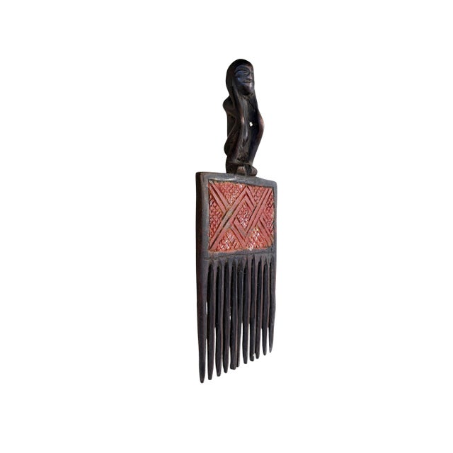 The Hemba Wedding wooden comb from Congo feature a seating Figure and is traditionally used as esteemed bridal ornaments...