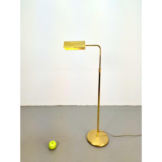 Adjustable Floor Lamp in Brass, 1970s, in Very Good conditions. Designed 1970 to 1979 European Plug (up to 250V).The...