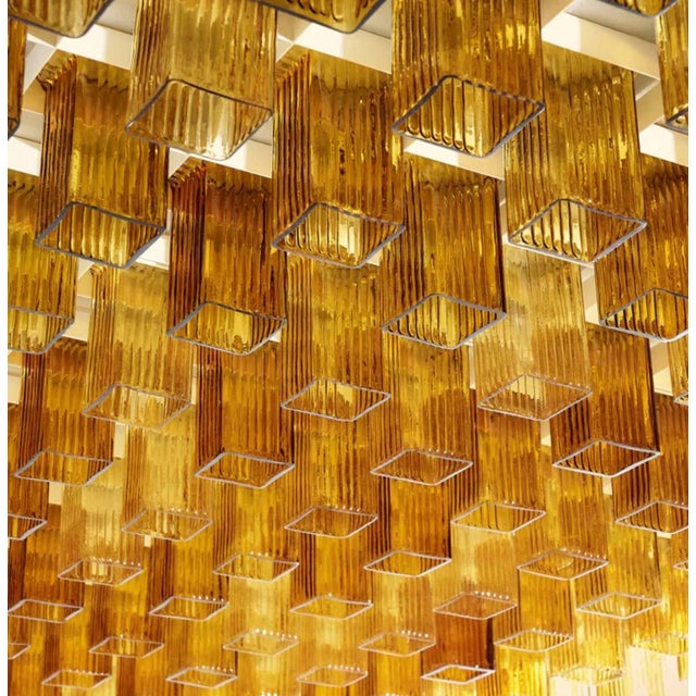 This ceiling light has no electrical system, as the structure is interlocking and the electrical system was in the...