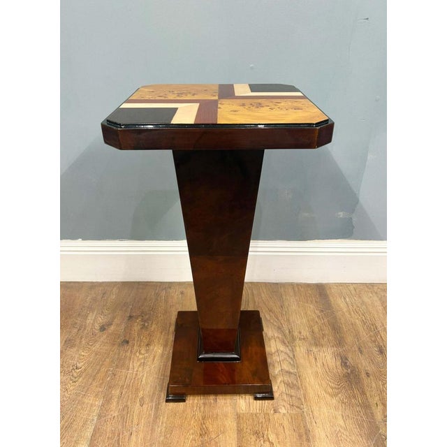 Gorgeous pair of art deco revival pedestal stands Features distinctive inlay work to the top with square shapes inset into...