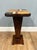 Gorgeous pair of art deco revival pedestal stands Features distinctive inlay work to the top with square shapes inset into...