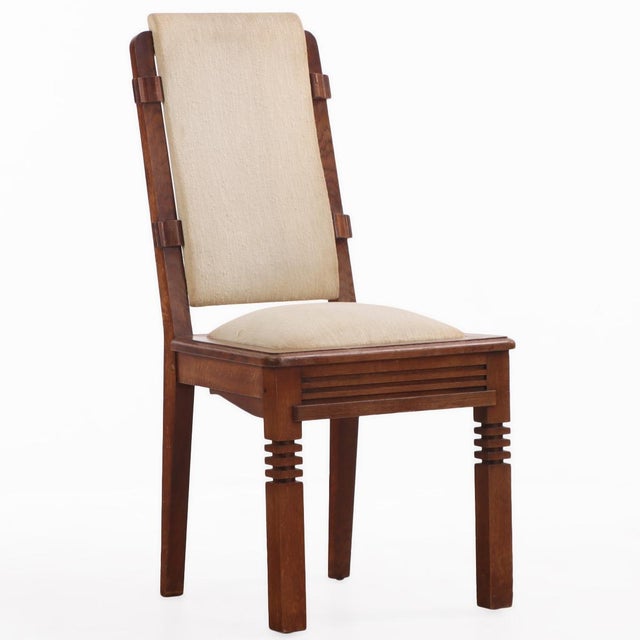 Set of six French oak dining chairs by Charles Dudouyt, circa 1940, each bearing the maker's signature / mark on the wood...