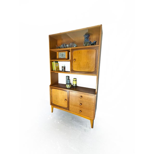 A distinguished example of british mid-century furniture design, this 'stateroom' room divider by stonehill dates from the...