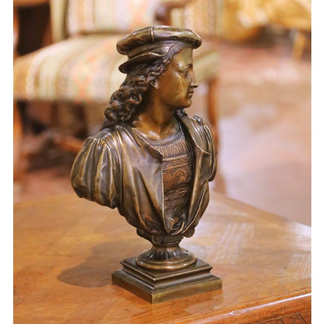 Circa 1880, this elegant antique French bronze bust portrays a refined Renaissance gentleman with a contemplative...