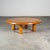 Rare round coffee or sofa table in solid stained pine, produced in France during the late 1960s. The design captures the...
