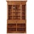 A handsome Belgian two-part cabinet crafted in solid pine, dating to circa 1900. This architectural case piece features a...