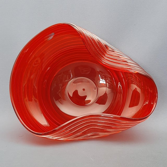 Wonderful modern Italian centerpiece, in red Murano glass with a particular handkerchief design and external spiral in...