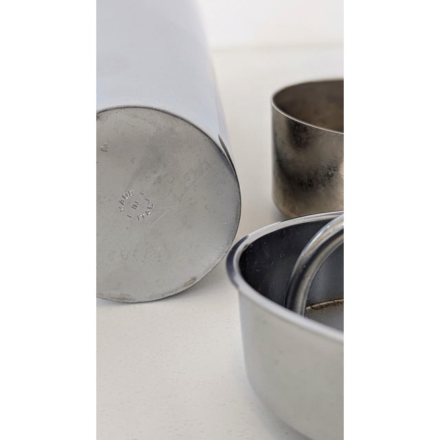 This brushed stainless steel cocktail strainer is a masterwork of Italian modernism. Featuring a conical silhouette with...